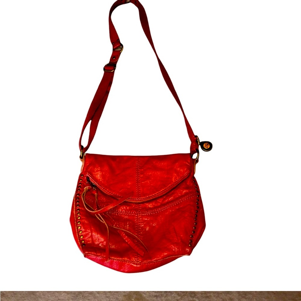 Brand new never used The Sak red/burgundy purse